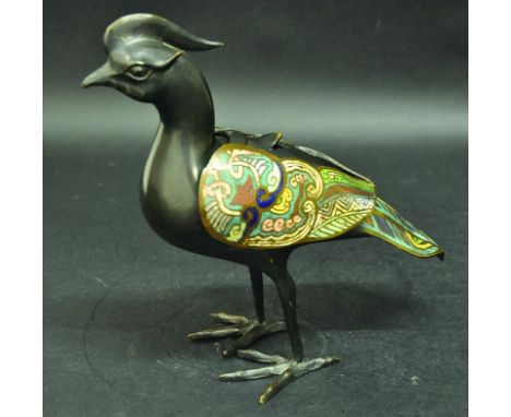 AN ORIENTAL CHAMPLEVE CENSER & COVER, in the form of a standing phoenix, the wings and tail with inlaid enamel decoration, 10