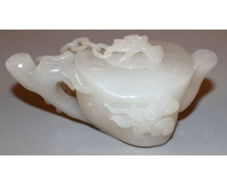 A CHINESE WHITE JADE-LIKE TEAPOT & COVER, the cover attached to the handle by a linked chain, the sides decorated with pine a