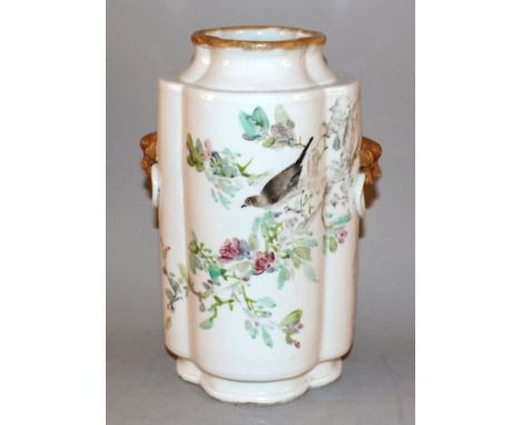 A CHINESE FAMILLE ROSE PORCELAIN VASE, the quatrefoil section body decorated to one side with calligraphy and sages beneath a