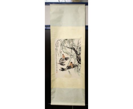 A CHINESE HANGING SCROLL PAINTED PRINT ON PAPER, depicting two boys each on a water buffalo beneath an overhanging tree, with