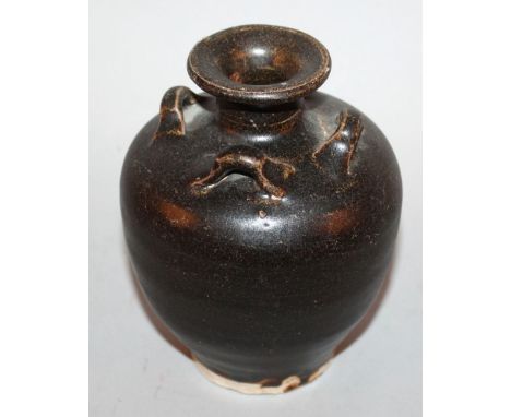 A SONG DYNASTY BROWN GLAZED CERAMIC JAR, the shoulders with four lug handles, 5.6in high. 