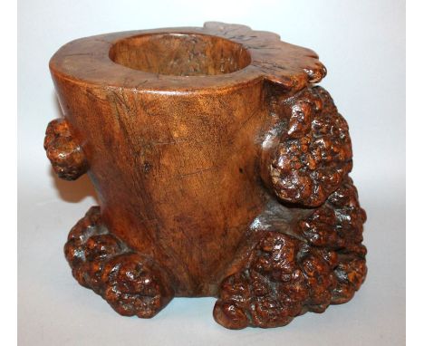 A LARGE CHINESE NATURALISTICALLY CARVED BRUSH POT, well rendered in the form of a knarled tree trunk, 11.8in wide at widest p