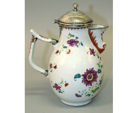 AN 18TH CENTURY CHINESE QIANLONG PERIOD SILVER-MOUNTED FAMILLE ROSE PORCELAIN JUG, with hinged cover, the unmarked silver mou