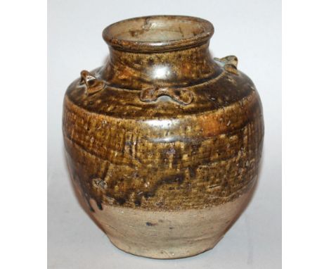 A SAWANKHALOK BROWN GLAZED CERAMIC JAR, 14th/16th Century, the shoulders moulded with four lug handles, 7in high. 