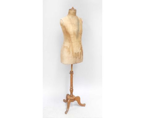 An Early 20th Century Stockman Mannequin Paris, with fabric mount on a tripod baseStaining and wear to the torse, knop missin