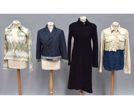 Modern Ladies Costume, comprising a white cotton collared shirt with green embroidery, open seam under the arms, designed by 