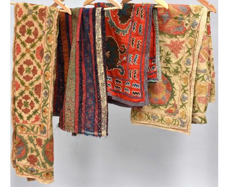 Mainly Early 20th Century Assorted Textiles, comprising a small Suzani style panel, worked on a red cotton ground with large 