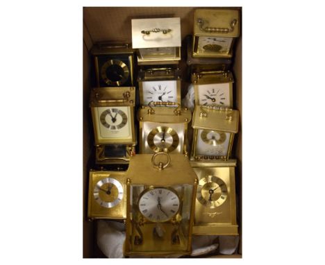 Box containing fourteen modern lacquered brass carriage-style mantel clocks   Condition: 