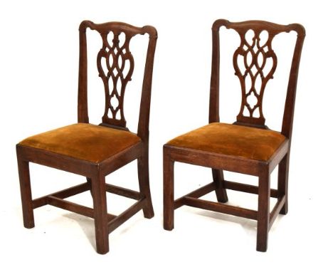 Pair of 19th Century Chippendale style mahogany side chairs, each having a typical pierced vase shaped back splat, drop-in se