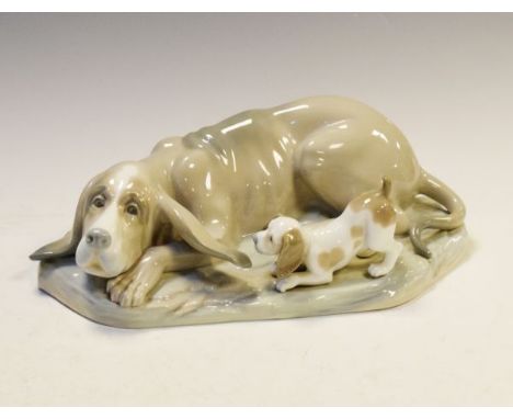 Nao figure group depicting a dog with a puppy   Condition: 