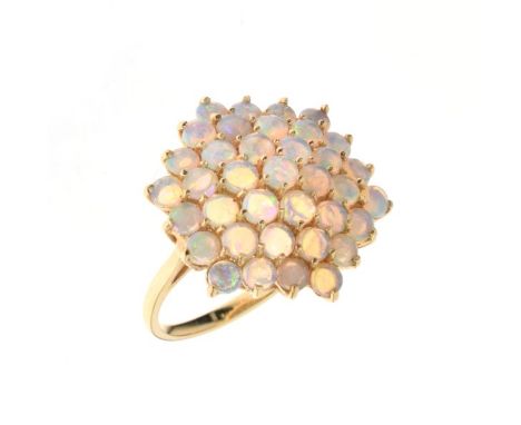 14ct gold and opal cluster dress ring set thirty-seven circular cabochons to a hallmarked shank, 7.5g gross approx, size V   