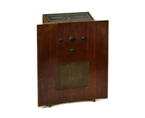 Vintage Murphy 188 walnut-cased floor standing 2-band radio of crescent form with integral speaker, 86cm high   Condition: 