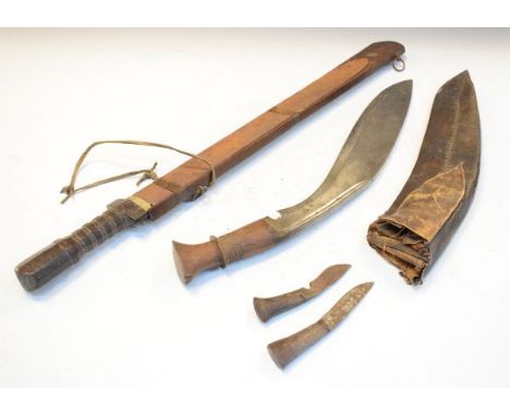 Vintage kukri together with another Eastern short sword   Condition: 