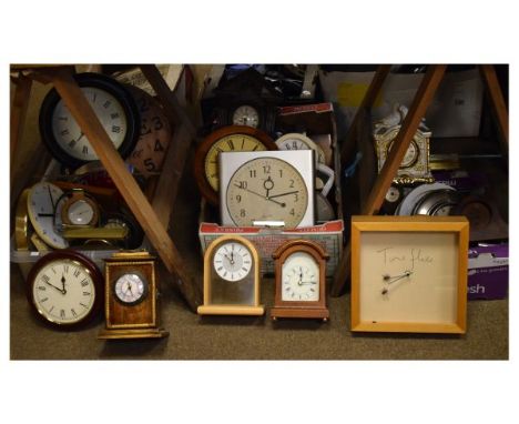 Three boxes containing large selection of mid to late 20th Century mantel and wall clocks, most battery-operated   Condition: