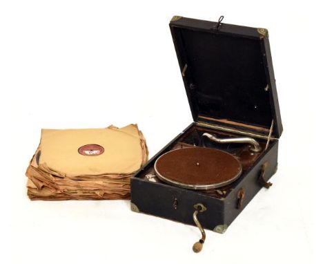 Vintage table top gramophone with crank handle, together with a large selection of records   Condition: 
