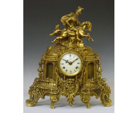French-style gilt metal mantel clock by Imperial with Roman dial and Cavalier to surmount, 42.5cm high   Condition: 