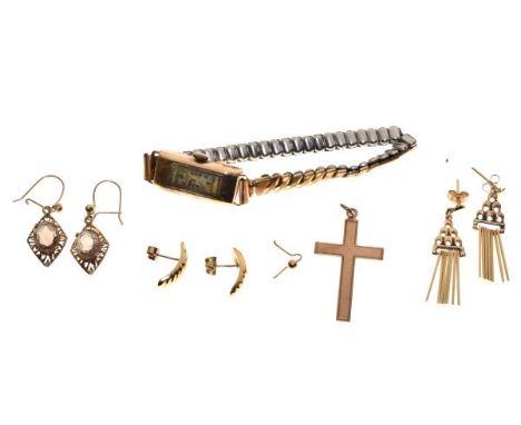 Assorted yellow metal jewellery to include; cross pendant, two pairs of earrings, and a lady's cocktail watch with flexible b