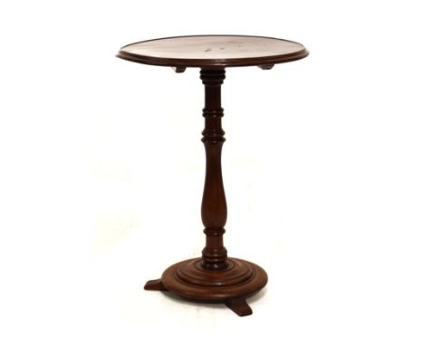 Mahogany tripod occasional table with moulded circular top on spindle stem and disc base with three feet   Condition: 