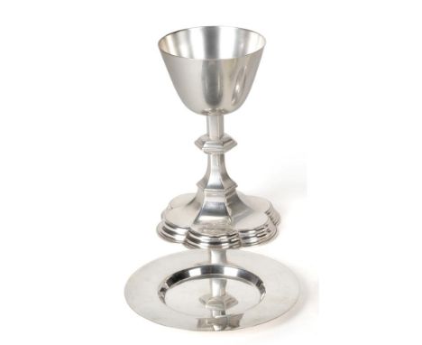 A Silver Chalice and Paten, A R Mowbray & Co Ltd, London 1940, the plain bowl on knopped hexagonal stem and lobed spreading f