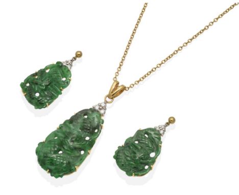 An 18 Carat Gold Jade and Diamond Pendant and Earring Suite; carved and pierced jade plaques depicting dragons, beneath a clu