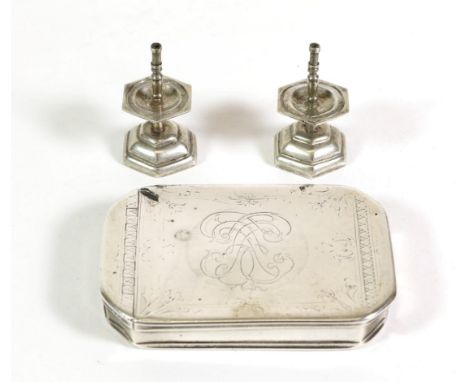 An Early 18th Century Silver Snuff Box, unmarked circa 1730, rectangular with cut corners, the cover hinged to one end, engra