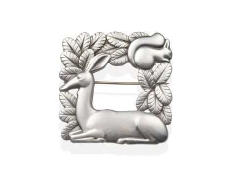 A Georg Jensen Silver Brooch, Designed by Arno Malinowski, model number 318, of square form, depicting a deer and squirrel am