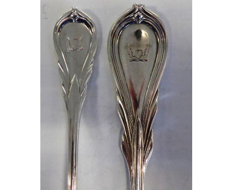 A Victorian Silver Lily Pattern Basting Spoon and Sauce Ladle, Chawner & Co, London 1856, engraved with a crest of a winged h
