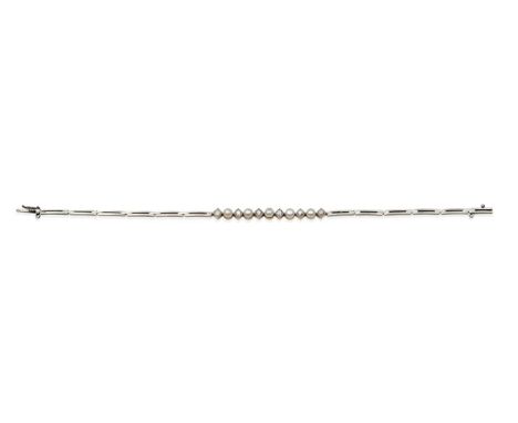 A Pearl and Diamond Bracelet, button pearls alternate with old cut diamonds in milgrain kite-shaped settings, to a split long