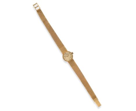 A Lady's 18ct Gold Wristwatch, signed Tissot, model: Stylist, circa 1970, lever movement, champagne coloured dial with baton 