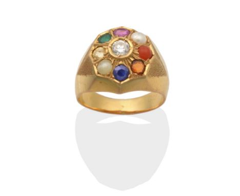 A Diamond and Multi-Gemstone Cluster Ring, a round brilliant cut diamond within an octagonal border set with a round cut ruby