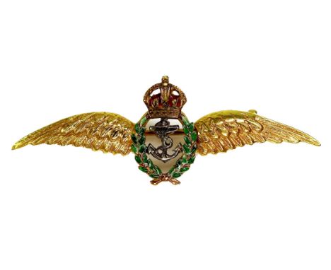 A 9ct gold Royal Naval Air Service (RNAS) sweetheart brooch, circa 1954, in the form of a pair of wings centred by an anchor 