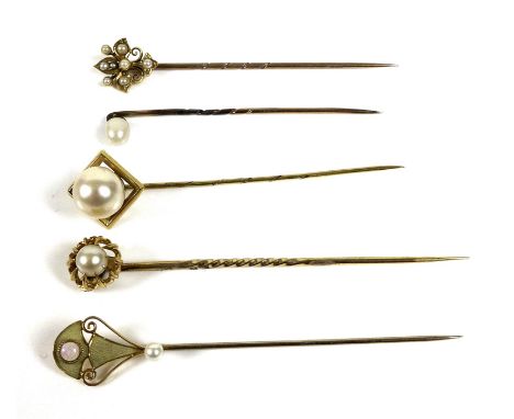 A group of gold stick pins, comprising an Art Nouveau 10ct gold, pearl and opal pin, 1.3g, an 18ct gold a pearl flowerhead pi