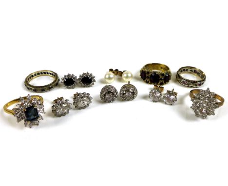 A group of white stone jewellery, comprising three pairs of stud earrings, one a pair of solitaires on 9ct gold posts, the ot