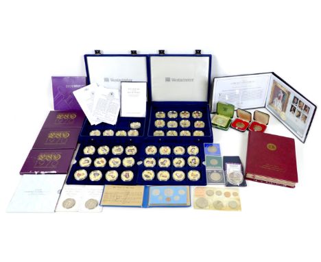 A small collection of modern UK and World coins, including Coloured Portrait Collection, 41 coin set, in two blue cases, with