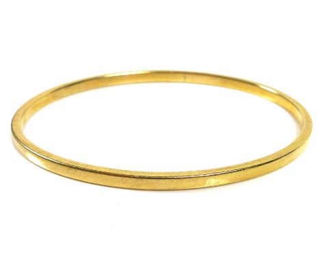 A 9ct gold bangle, 20.6g. 
