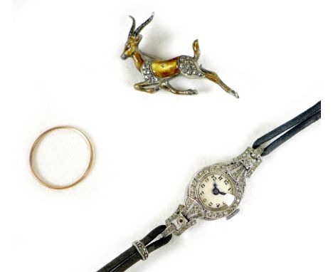 A small group of jewellery, comprising an Art Deco lady's rhodium cased and paste set cocktail watch, with circular white ena