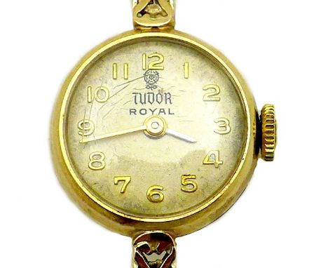 A Tudor Royal 9ct gold cased lady's wristwatch, circa 1960s, the circular silvered dial with raised gold Arabic numerals, gol