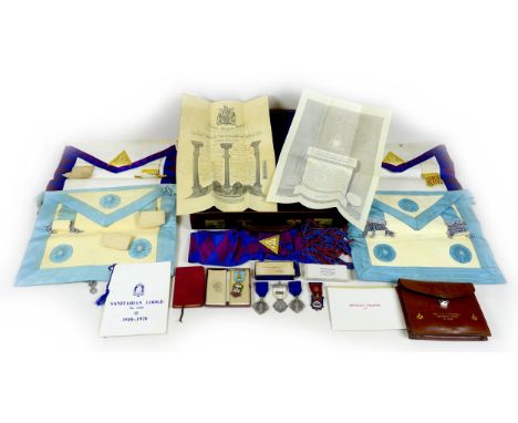 A collection of mid-20th century Masonic medallions and ephemera, including five silver medallions, two WWI 1914-1918 commemo