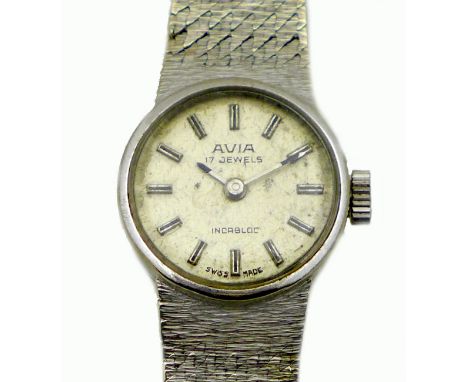 A vintage Avia 9ct white gold cased lady's wristwatch, circular silver dial with black baton numerals, black and silver index