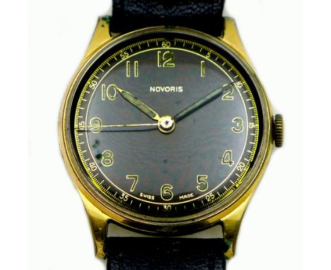 A vintage Novoris gold plated gentleman's wristwatch, circa 1950, circular black dial with gold and luminous Arabic numerals,