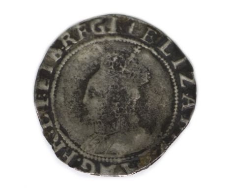 An Elizabeth I silver shilling, possibly circa 1590s, with heavily rubbed portrait and long cross shield back, 5.4g, 29mm dia