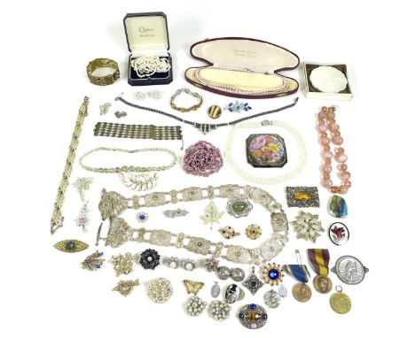 A group of costume jewellery and medals, including compacts, faux pearl necklaces, silver brooches, a silver and turquoise fi