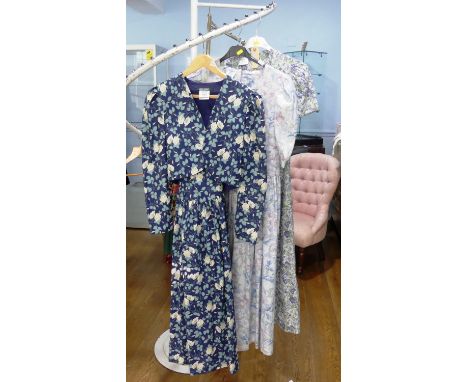 Vintage Fashion, Laura Ashley circa late 1970s/early 1980s: A blue ground  floral print cotton summer outfit comprising a str