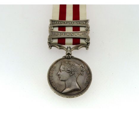 Indian Mutiny Medal, 1858, named to R. Tagg. 90th. Lt. Infy., with two clasps, Defence of Lucknow and Lucknow. Confirmed on t