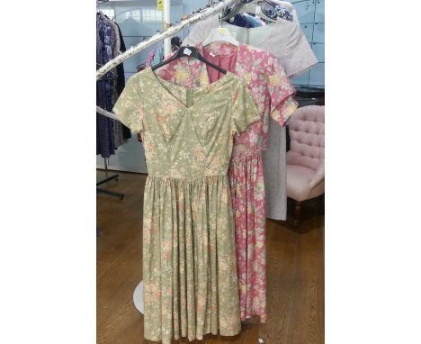 Vintage Fashion, Laura Ashley circa late 1970s/early 1980s: A pale sage-green ground rose print cotton short sleeved summer d