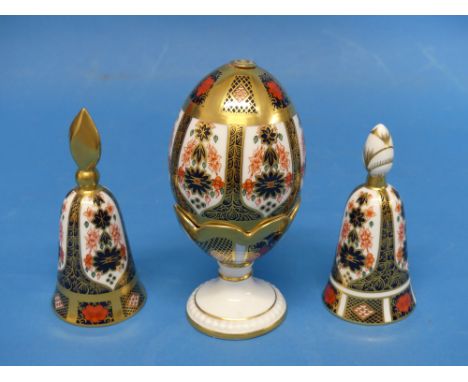 A Royal Crown Derby 1128 pattern Egg on Stand, the egg and stand decorated in Old Imari pattern, with gold stopper, stamped w