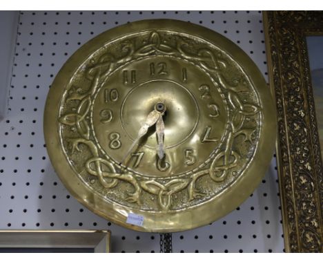 An Arts and Crafts circular Brass Wall Clock, in the manner of Margaret Gilmour, Glasgow School, with a Celtic style border a