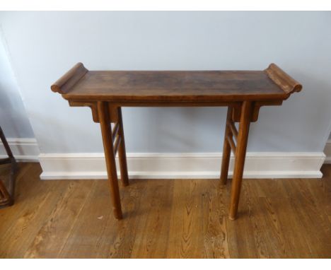 An early 20thC Chinese Alter Table, with scroll ends, splayed circular supports, united by a double stretcher on either end, 