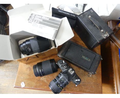 Cameras: a Nikon AF Nikkor 70-300mm f4-5.6 zoom lens, boxed, and a Nikon AF Nikkor 28-100mm f3.5-5.6 zoom lens, together with