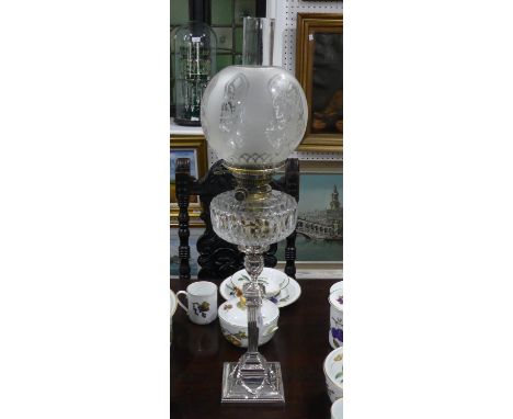 An Edwardian silver-plated Oil Lamp, by Walker &amp; Hall, formed as a square fluted column with chased decoration, with etch